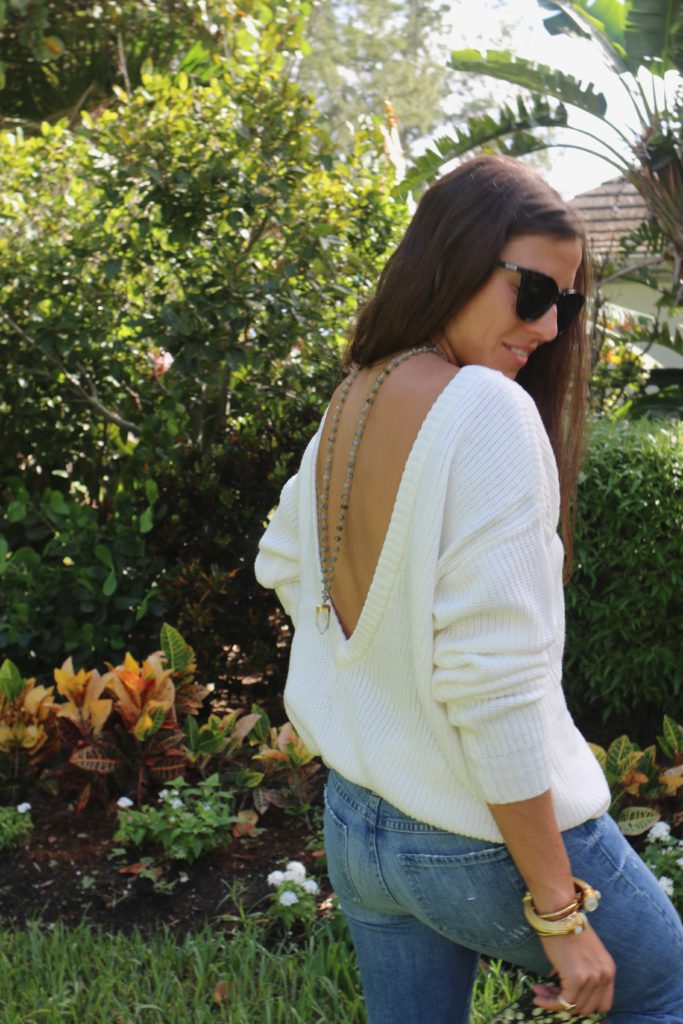 backless sweater + crystal necklace