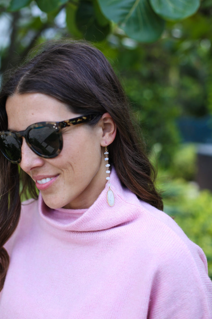 Pink Turtleneck Sweater with Earrings